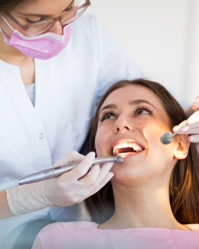 Dentist and patient in dentist office